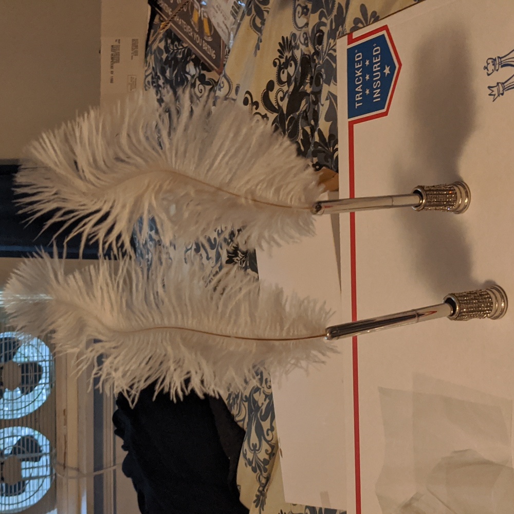 Two feather pens with rhinestones holders